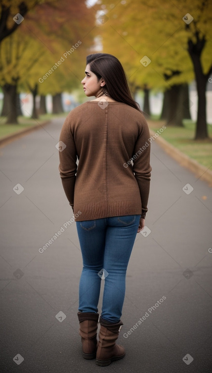 Pakistani adult non-binary with  brown hair