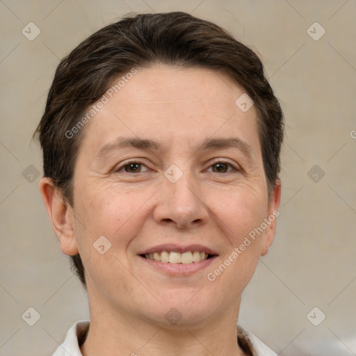 Joyful white adult female with short  brown hair and brown eyes