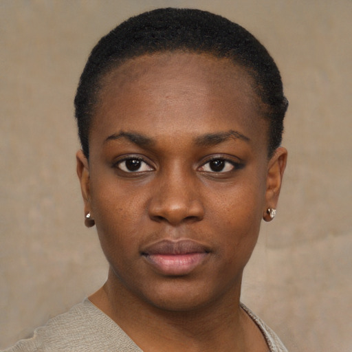 Neutral black young-adult female with short  black hair and brown eyes