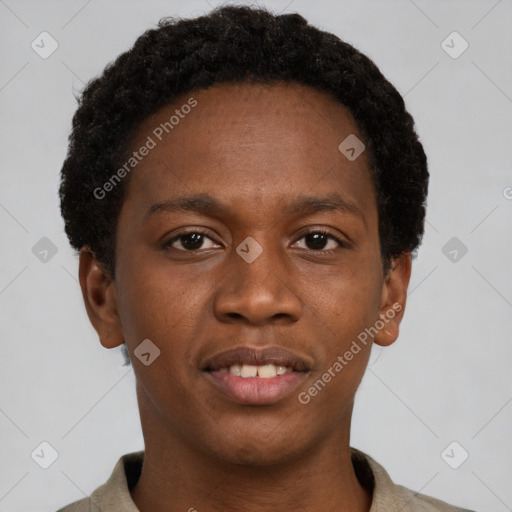 Joyful black young-adult male with short  brown hair and brown eyes