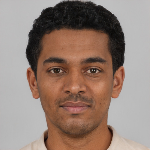Neutral black young-adult male with short  black hair and brown eyes