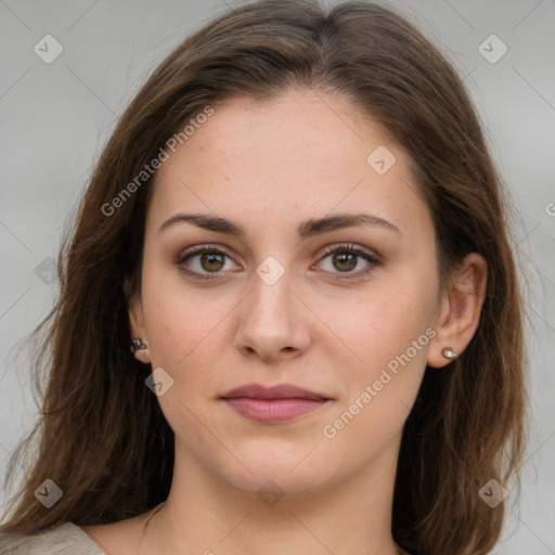 Joyful white young-adult female with medium  brown hair and green eyes