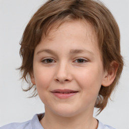 Joyful white child female with medium  brown hair and brown eyes