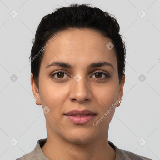 Joyful latino young-adult female with short  brown hair and brown eyes