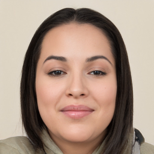 Joyful white young-adult female with long  brown hair and brown eyes