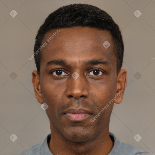 Neutral black young-adult male with short  black hair and brown eyes