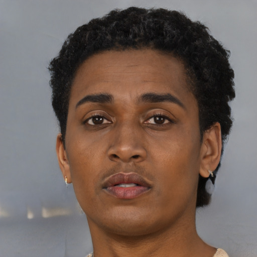Neutral black young-adult male with short  brown hair and brown eyes