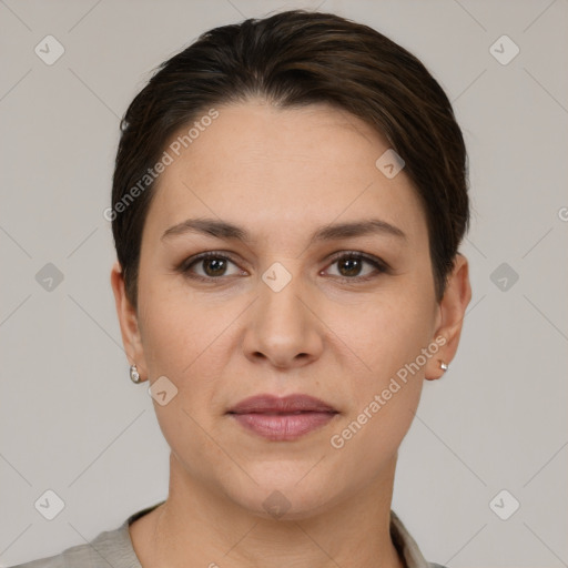 Joyful white young-adult female with short  brown hair and brown eyes