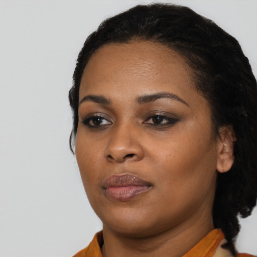 Neutral black young-adult female with short  black hair and brown eyes