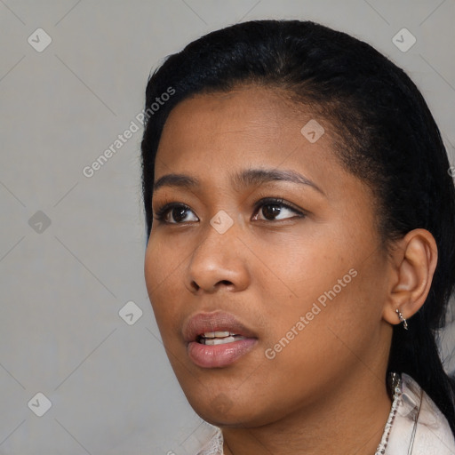 Neutral black young-adult female with short  black hair and brown eyes