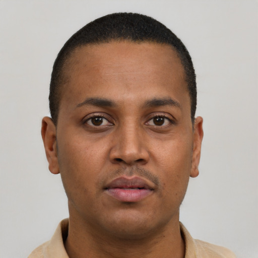 Neutral latino young-adult male with short  brown hair and brown eyes