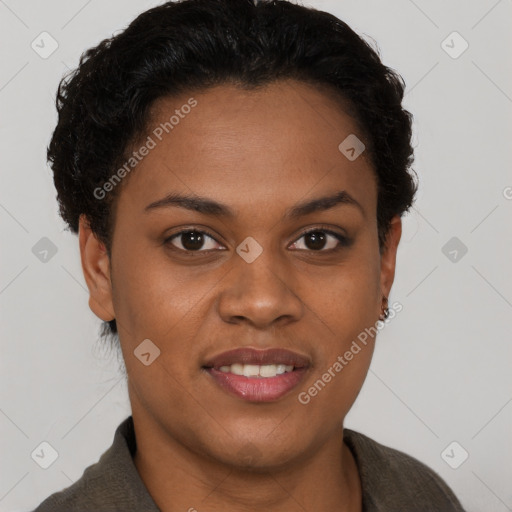 Joyful black young-adult female with short  brown hair and brown eyes