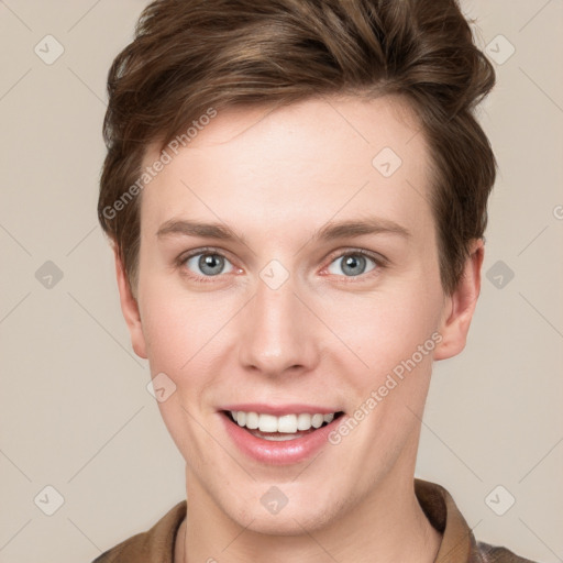 Joyful white young-adult female with short  brown hair and grey eyes