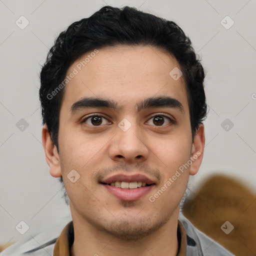 Joyful latino young-adult male with short  brown hair and brown eyes