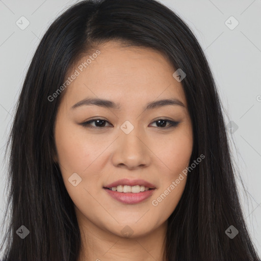 Joyful asian young-adult female with long  brown hair and brown eyes