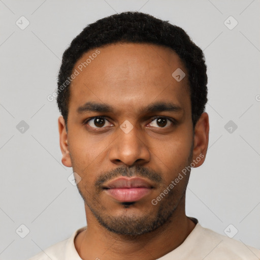 Neutral latino young-adult male with short  black hair and brown eyes