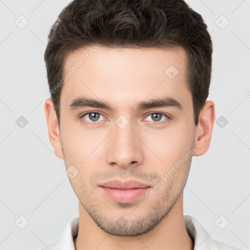 Neutral white young-adult male with short  brown hair and brown eyes