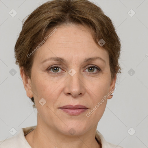 Joyful white adult female with short  brown hair and grey eyes