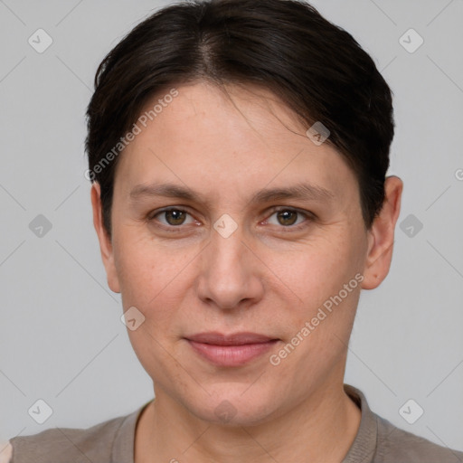 Joyful white young-adult female with short  brown hair and grey eyes