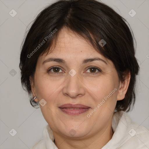 Joyful white adult female with medium  brown hair and brown eyes