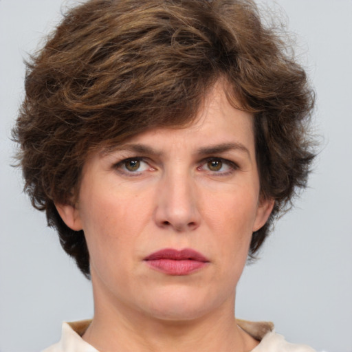 Neutral white adult female with short  brown hair and brown eyes