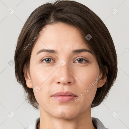 Neutral white young-adult female with medium  brown hair and brown eyes