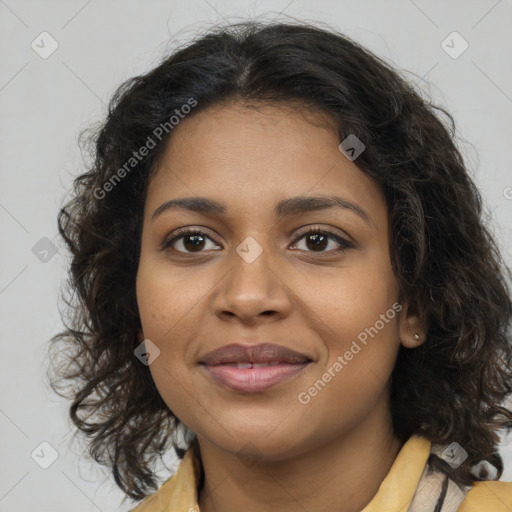 Joyful black young-adult female with medium  brown hair and brown eyes