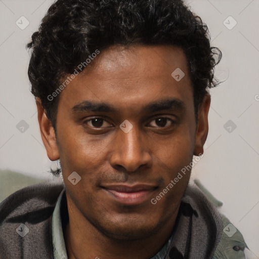 Joyful black young-adult male with short  black hair and brown eyes