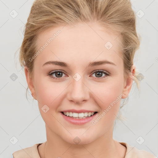 Joyful white young-adult female with medium  brown hair and blue eyes