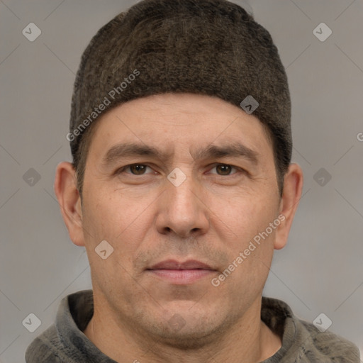 Joyful white adult male with short  brown hair and grey eyes