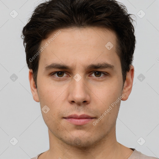 Neutral white young-adult male with short  brown hair and brown eyes