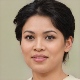 Joyful asian young-adult female with medium  brown hair and brown eyes