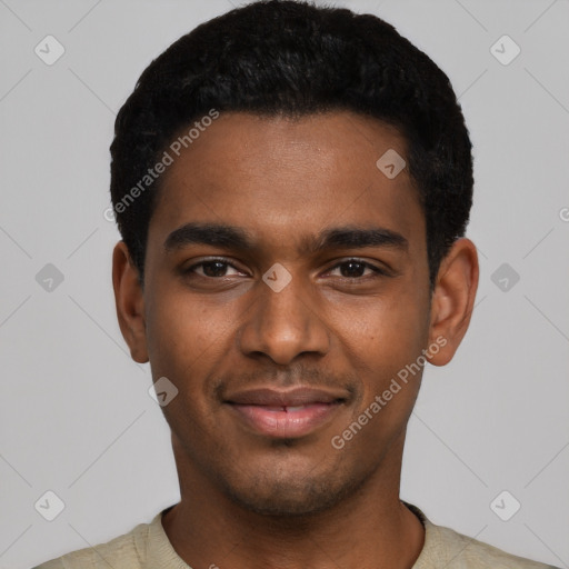 Joyful black young-adult male with short  black hair and brown eyes