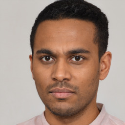 Neutral latino young-adult male with short  black hair and brown eyes