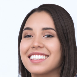 Joyful white young-adult female with long  black hair and brown eyes