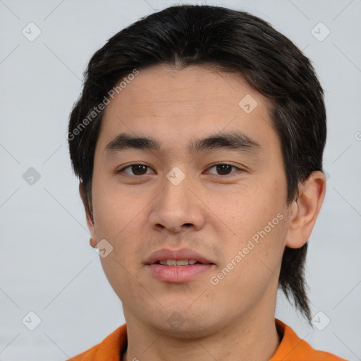 Neutral asian young-adult male with short  brown hair and brown eyes