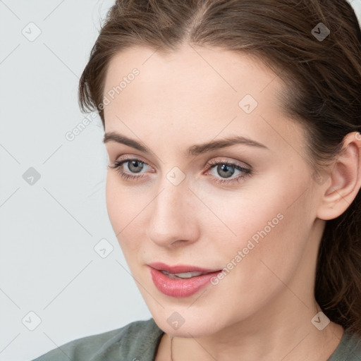 Neutral white young-adult female with medium  brown hair and grey eyes