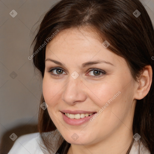 Joyful white young-adult female with medium  brown hair and brown eyes