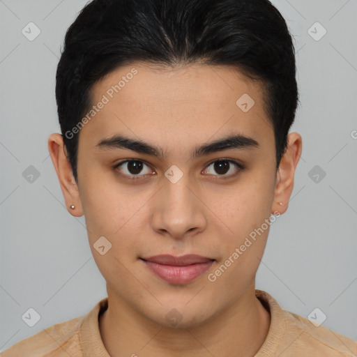 Joyful latino young-adult male with short  brown hair and brown eyes