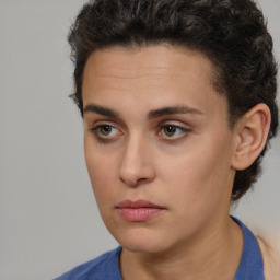 Neutral white young-adult female with short  brown hair and brown eyes