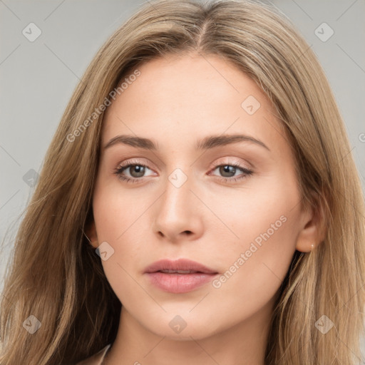 Neutral white young-adult female with long  brown hair and brown eyes