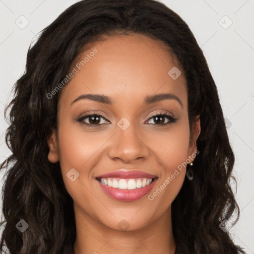 Joyful latino young-adult female with long  brown hair and brown eyes