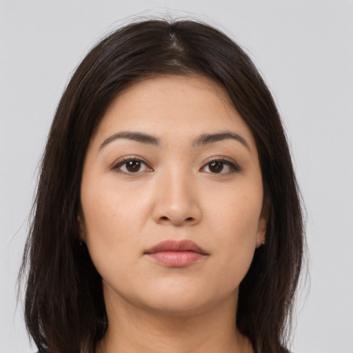 Neutral white young-adult female with long  brown hair and brown eyes