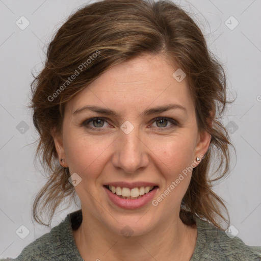 Joyful white young-adult female with medium  brown hair and blue eyes
