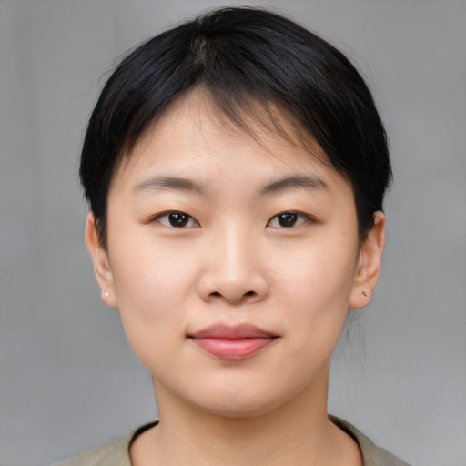 Neutral asian young-adult female with short  brown hair and brown eyes