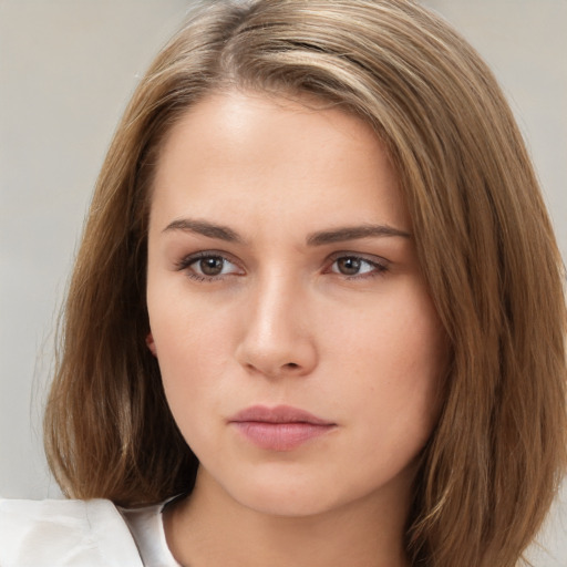 Neutral white young-adult female with medium  brown hair and brown eyes