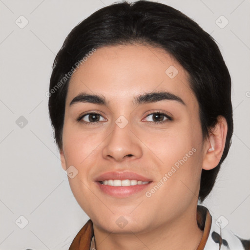 Joyful white young-adult female with medium  black hair and brown eyes