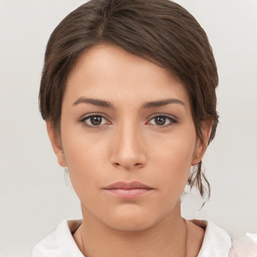 Neutral white young-adult female with short  brown hair and brown eyes