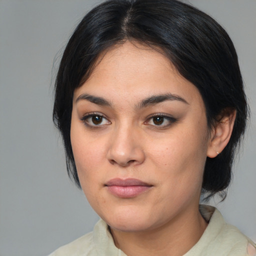 Neutral latino young-adult female with medium  black hair and brown eyes