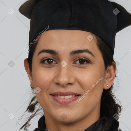 Joyful latino young-adult female with medium  black hair and brown eyes
